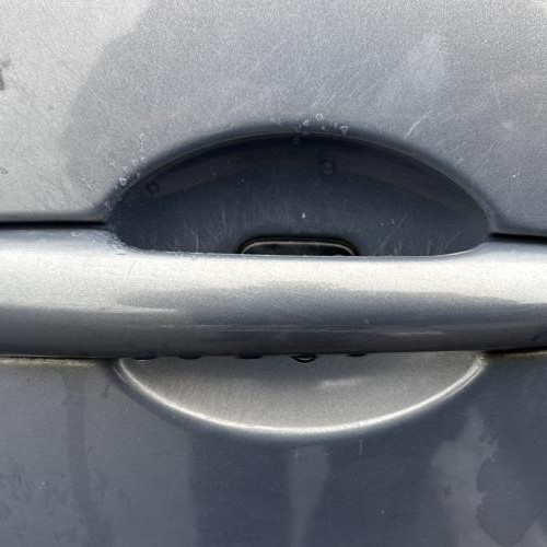 Poignee porte arriere droit