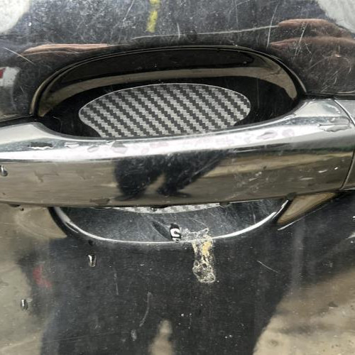 Poignee porte avant gauche