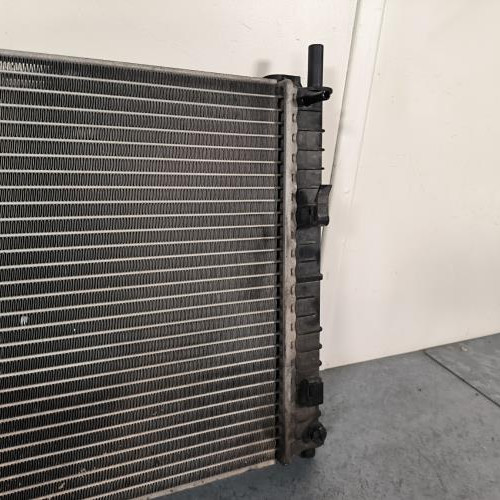 119075689-f4b6b995-13bd-4d8c-ad01-29f8c5da0751-Piece-Radiateur-eau-1325830-FORD-FIESTA-5-PHASE-1-6d56e6dc4aa98bed1d5e79fd499f6c6d655fd568874866402ac81952842e6f04_m.jpg