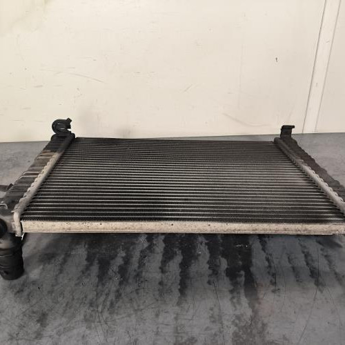 119075689-54cb2aae-46fb-498d-8989-3c4088c066da-Piece-Radiateur-eau-1325830-FORD-FIESTA-5-PHASE-1-14d014f6a42a360cd6671a973cda62a9691326c3ea3c8fc7cc6af5e3e81be761_m.jpg