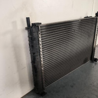 119075689-0bfd43a6-7d9b-4f2c-b994-8863ada46e02-Piece-Radiateur-eau-1325830-FORD-FIESTA-5-PHASE-1-ce96e3885d90ba2c74f54b6323217292b5893cdb1b279da8ba300c7265428a8f_m.jpg