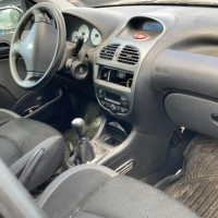 Vehicule-PEUGEOT-206-2006-f387f649e43592a5bdc52a9a7fd340a0bbc6b95d8e4d1291865cc0c478214e86.jpg