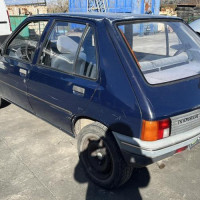 Vehicule-PEUGEOT-205-PHASE-2-1987-606d72812ddd954b902c473c636a05ba7cf44416624431399391bd67ab9354f4_mtn.jpg