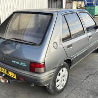 Vehicule-PEUGEOT-205-PHASE-2-1995-812d8b5669ab014ac50b5a18ef517bffdb07ce2f2926f7da3d43a778b1ba41c2_mtn.jpg